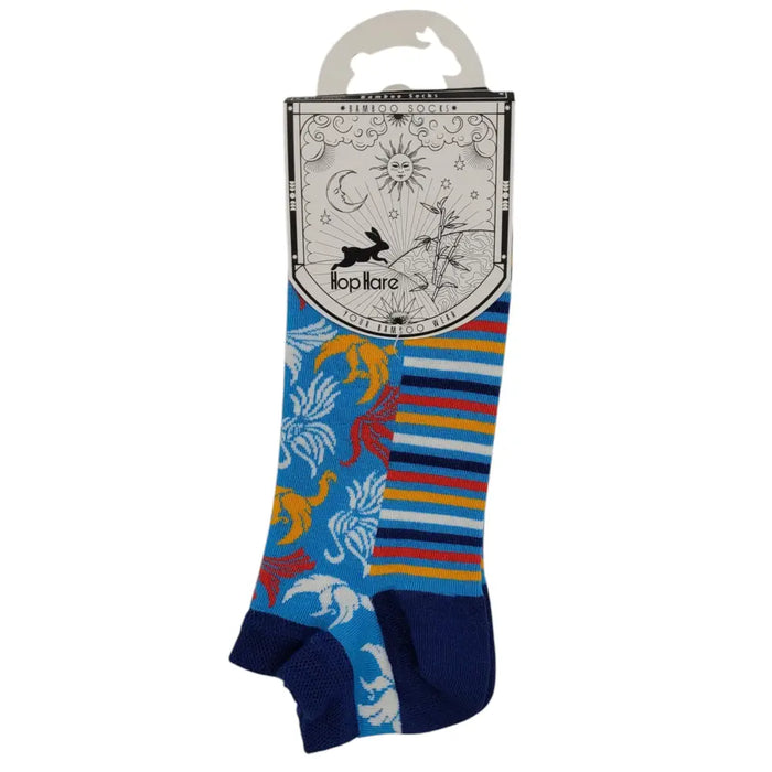A pair of hop hare bamboo trainer socks in vibrant blue with colorful animal prints and red yellow navy stripes