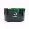 Dark green glass jar candle with white hop hare logo and text hop hare crystal magic flower the lovers edition