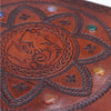 Brown leather tomb book with embossed dragon design and colorful chakra stones measuring 13 by 10 inches