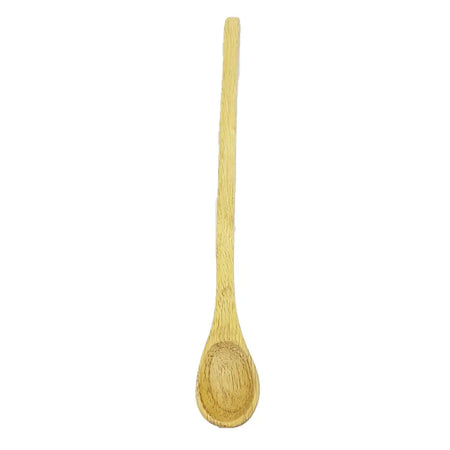 A light-colored mango wood spoon with visible grain patterns from ian snow artisan kitchen utensils set in a rainbow utensil jar