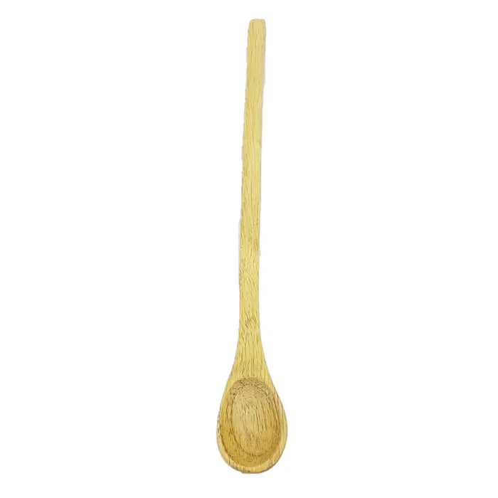 A light-colored mango wood spoon with visible grain patterns from ian snow artisan kitchen utensils set in a rainbow utensil jar