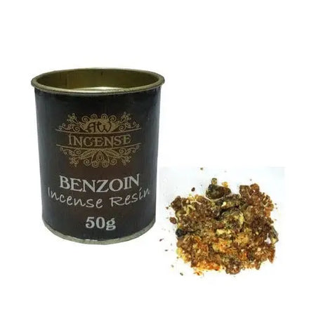 A dark brown tin with gold lettering labeled atw incense benzoin resin 50g beside granular resin and charcoal tablets