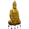 Golden brass buddha wind chime with five bells and blue glass beads hanging at the base