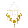 Brass indian chimes with golden crescent moon phases textured metal and colorful gemstones with dangling bells