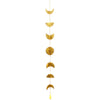 Golden brass moon phase wall hanging with textured hammered surfaces and a yellow tassel at the bottom with a bell