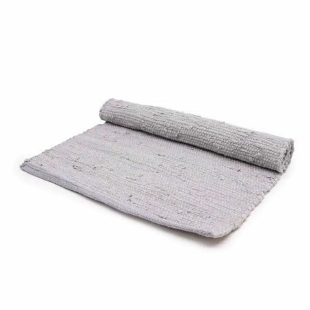 Gray indian handloom cotton rug with textured looped pile made from woven cotton for bath or indoor use