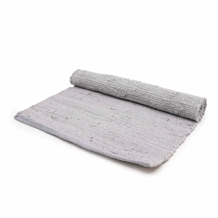 Gray indian handloom cotton rug with textured looped pile made from woven cotton for bath or indoor use