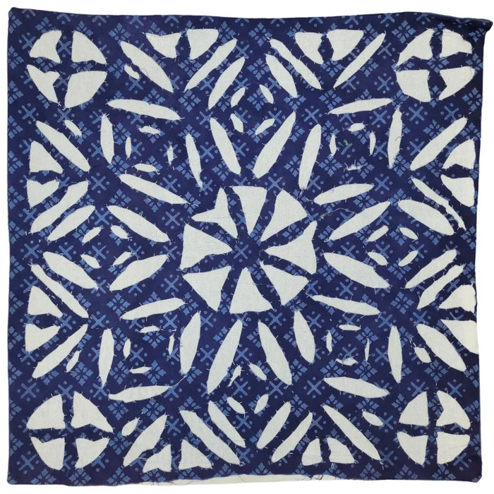 Blue and white indian patchwork cushion cover with geometric floral motifs in cotton fabric titled prayer of zion