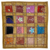 A vibrant standard cushion cover with patchwork sari tiles in red purple blue black and orange with embroidery details