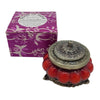 Red glossy ceramic candle jar with ornate white metal lid in antique style glass jar featuring rose flower scent