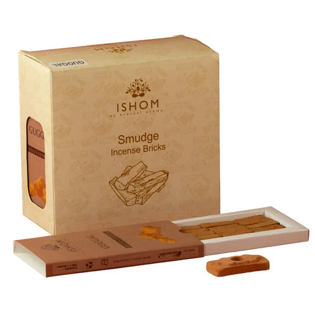 Tan rectangular ishom incense smudge bricks made from natural guggal resin with a small hole on one end