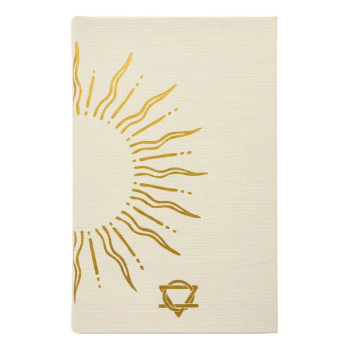 Cream-colored ivory gratitude journal with gold sunburst emblem and gold lining showing 120 pages inside