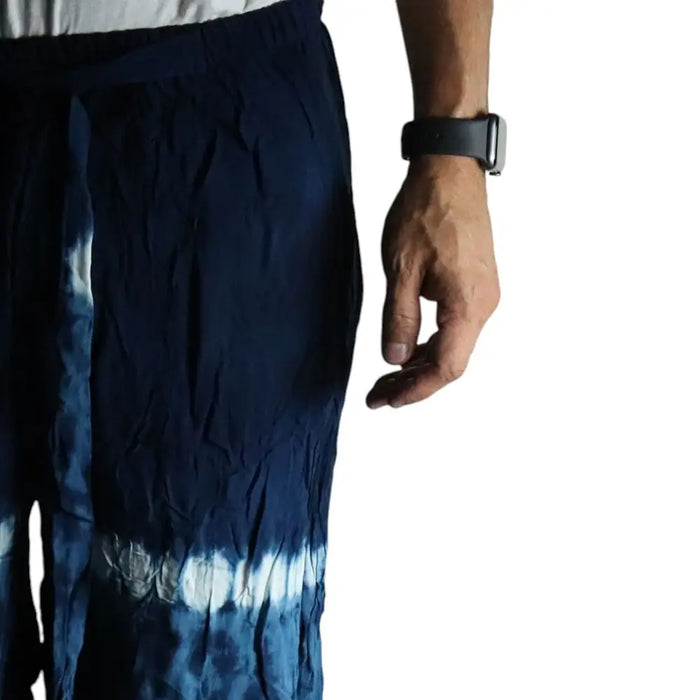 Dark blue tie-dye Japanese style lounge pants with relaxed silhouette and white streaks near the hem in large size