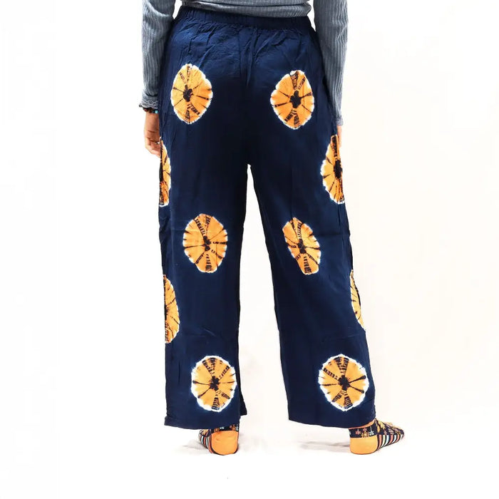 Navy and orange Japanese style lounge pants with wide legs and tie-dye circular patterns in large size