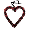 Red jingle bell heart-shaped wall hanging with black ribbon hanger made of metal for decorative use