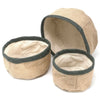 Set of three beige jute baskets with dark green trim made of burlap for storage and organization