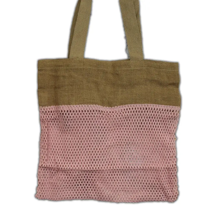 A pink cotton mesh bag with olive green fabric handles and a solid top panel made from jute and cotton materials