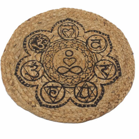 Jute place mat circular woven in natural beige with black chakra symbols printed on the surface