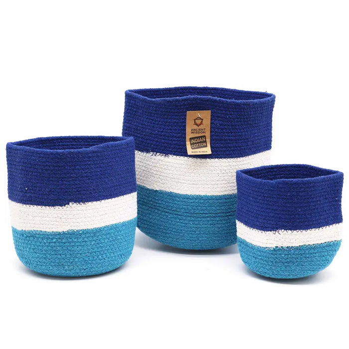 Set of three handwoven jute rope storage baskets with navy white and teal stripes featuring an evil eye design