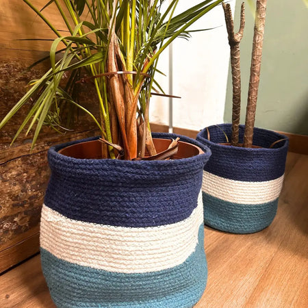 Navy cream and teal striped woven jute rope storage basket with evil eye design for plant pot or storage use