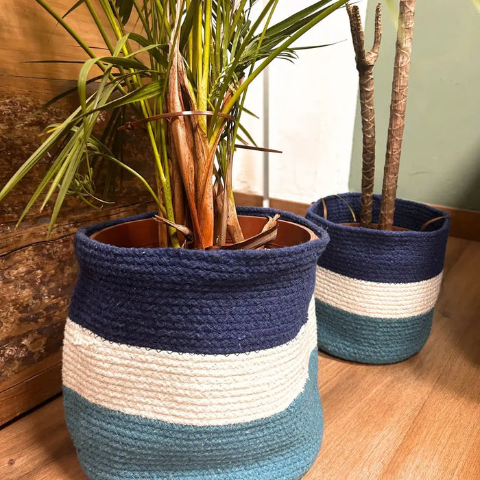 Navy cream and teal striped woven jute rope storage basket with evil eye design for plant pot or storage use