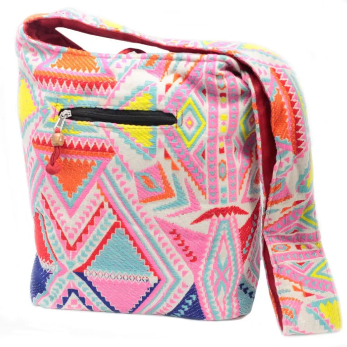 Kathmandu big bag canvas shoulder bag with vibrant pink orange and turquoise geometric pattern called sunrise