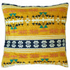 Vibrant yellow kilim throw pillow with geometric black white teal and terracotta patterns on standard cushion cover