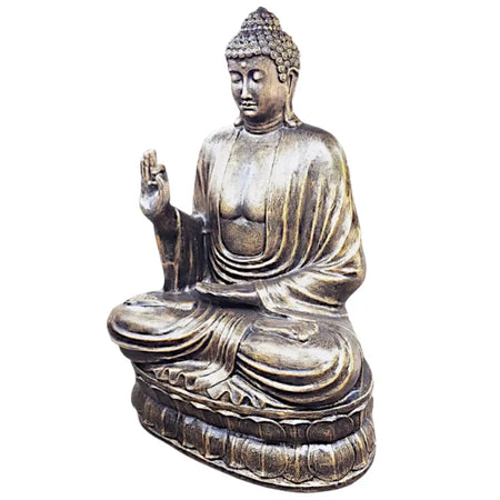 Large antique gold bronze buddha statue with intricate detailing in a serene meditative pose on a lotus base