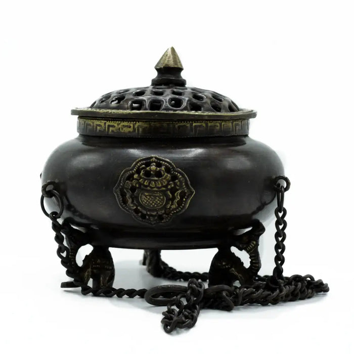 Large black brass Tibetan hanging pot incense burner with ornate lid decorative emblem and chain handles