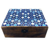 A large ceramic glazed wooden box with a mosaic lid featuring blue and white star patterns and geometric design