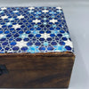 Large ceramic glazed wooden box with blue and white geometric mosaic pattern on the lid