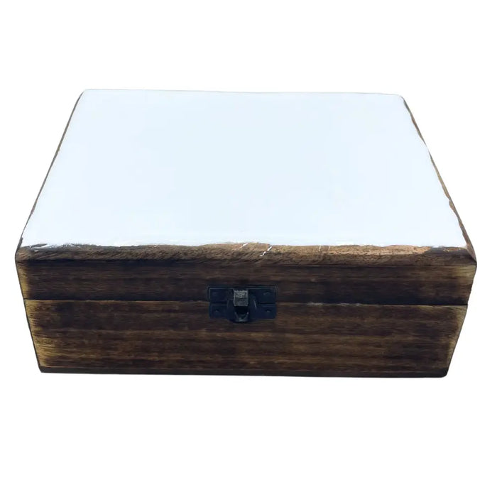 Large ceramic glazed wooden box with white smooth lid dark brown textured sides and black metal latch