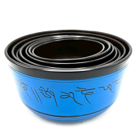 Blue tibetan singing bowl with black rim and inscribed mantras from large chakra set of seven singing bowls