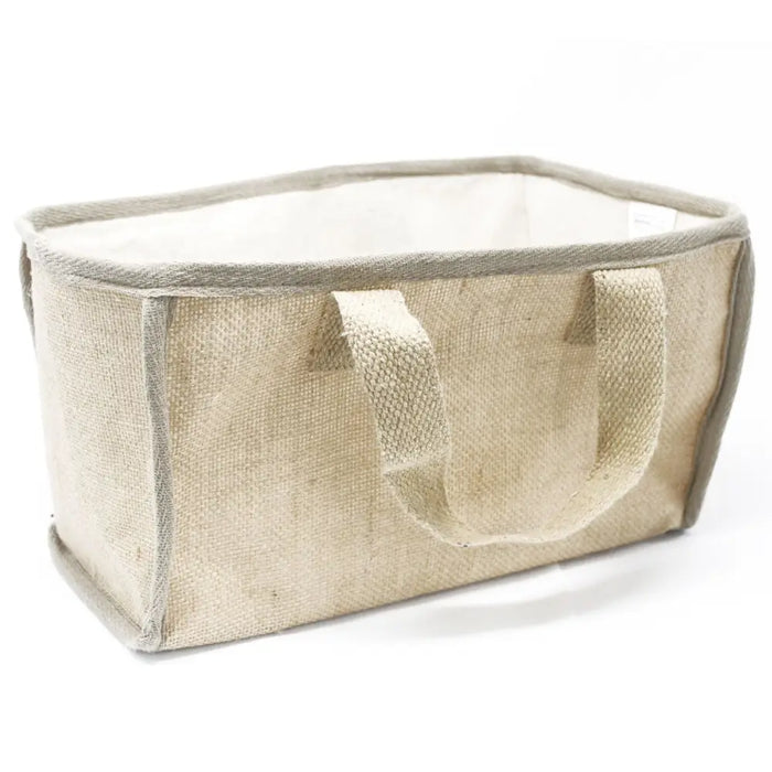 Beige woven canvas storage basket with reinforced handles and light gray trim large jute and cotton shopping basket natural