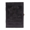 Black leather notebook with embossed gothic lettering and mystical symbols, large 10x7 book of shadows design