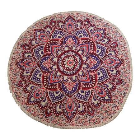 Large mandala roundy art blanket with fringed edges in pink purple and cream featuring floral and geometric patterns