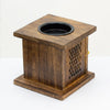 Dark brown mango wood large incense burner with black circular recess and lattice cutouts shaped like an elephant