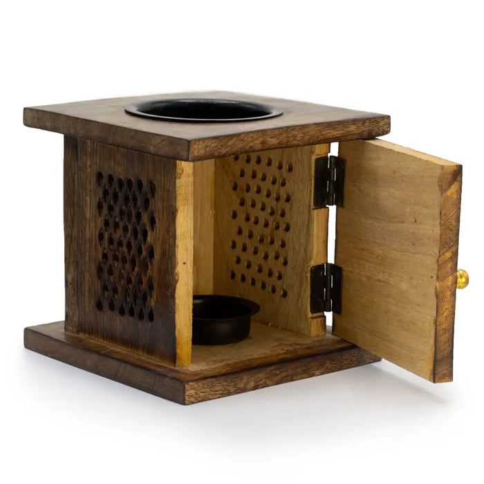 Large mango box oil burner made of mango wood with dark brown finish perforated sides and black ceramic inserts