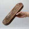 Large mango wood incense burner with hand carved floral patterns in warm dark brown wood incense design