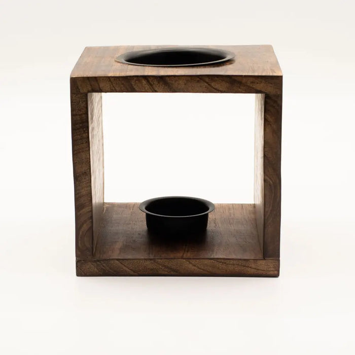 Dark wood cube-shaped mango wood oil burner with black top and base bowl featuring buddha face design