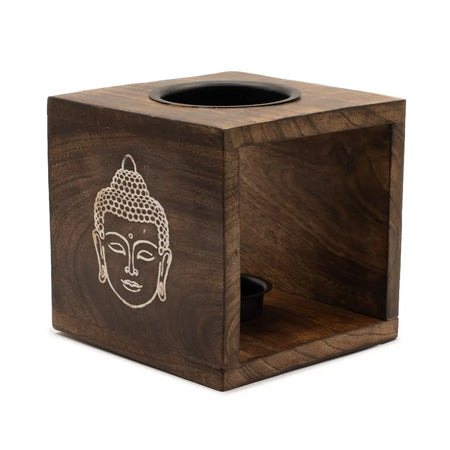 Dark brown mango wood oil burner cube with carved buddha face and two black circular openings