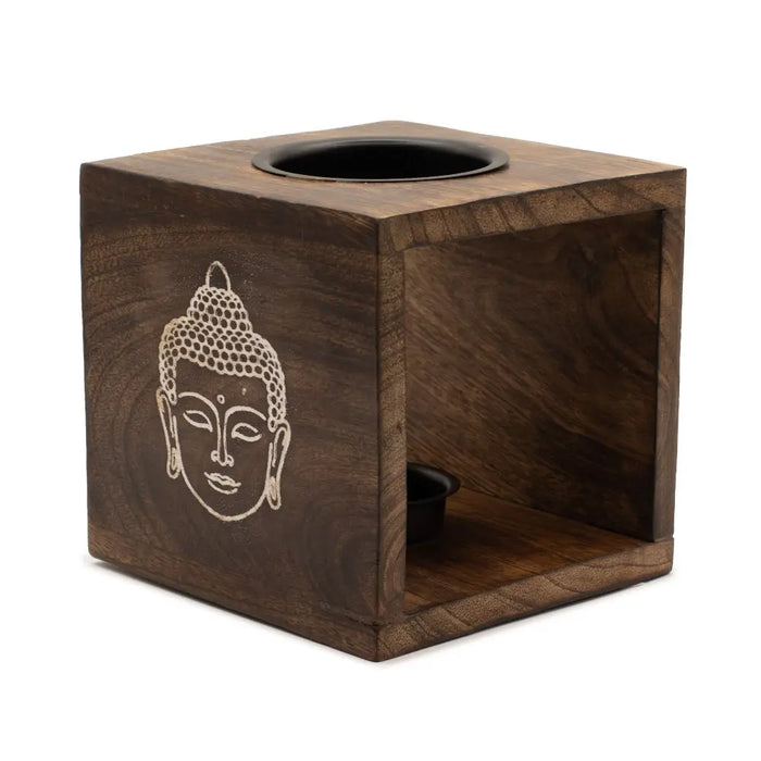 Dark brown mango wood oil burner cube with carved buddha face and two black circular openings
