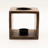 Brown mango wood oil burner cube with two black circular holders for large wood oil burning