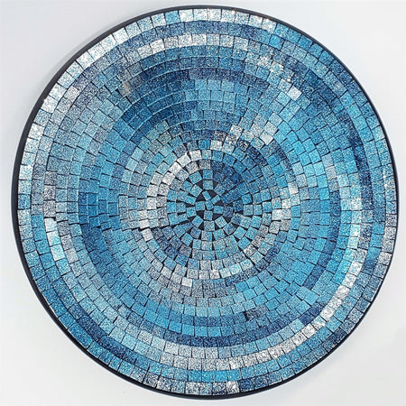 Large mosaic tile dish with circular blue and silver glittery textured tiles in concentric rings