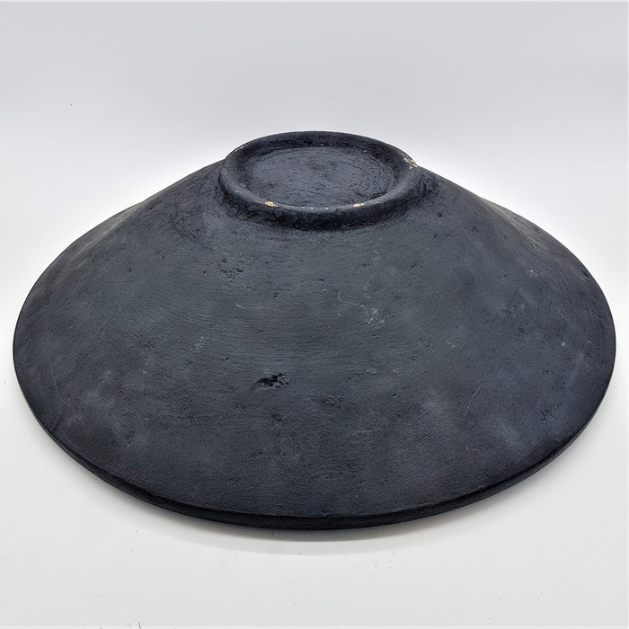 Large mosaic tile dish in turquoise with a dark gray textured ceramic bowl and slightly raised rim with uneven surface