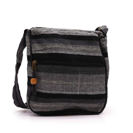 Large nepal sling bag with black and gray stripes woven fabric and wooden zipper pull called mountain granite
