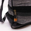 Large nepal sling bag in black and gray woven stripes with brass zipper pull and wooden bead mountain granite design