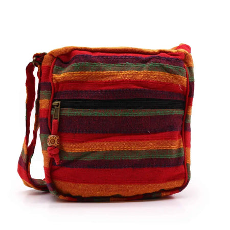 Large nepal sling bag with vibrant red orange and green striped woven fabric crossbody design