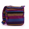Large nepal sling bag with vibrant purple blue and gold striped woven fabric crossbody design wild flowers pattern