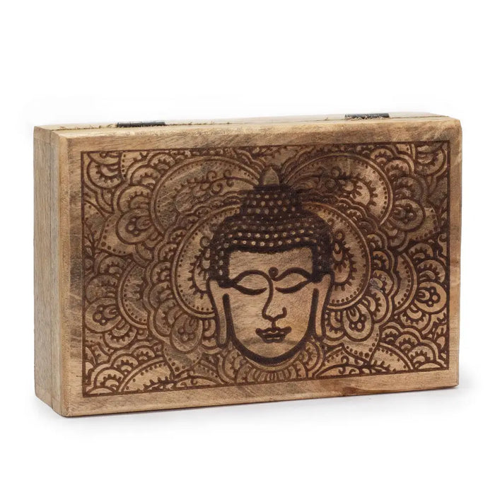 Large rectangular wooden box with hand carved buddha face and black engraved mandala patterns on natural wood surface